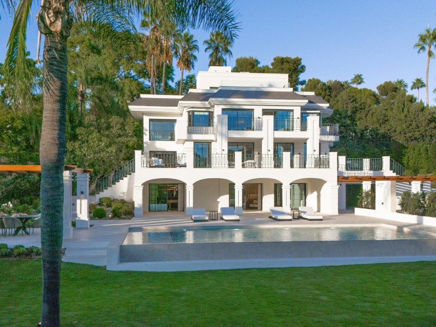 Six bedroom villa at Las Brisas Golf in Marbella Golf Valley Exterior view of a six bedroom villa at Las Brisas Golf in Nueva Andalucia, Marbella Golf Valley, showing the terraces, garden and swimming pool on the Costa del Sol.